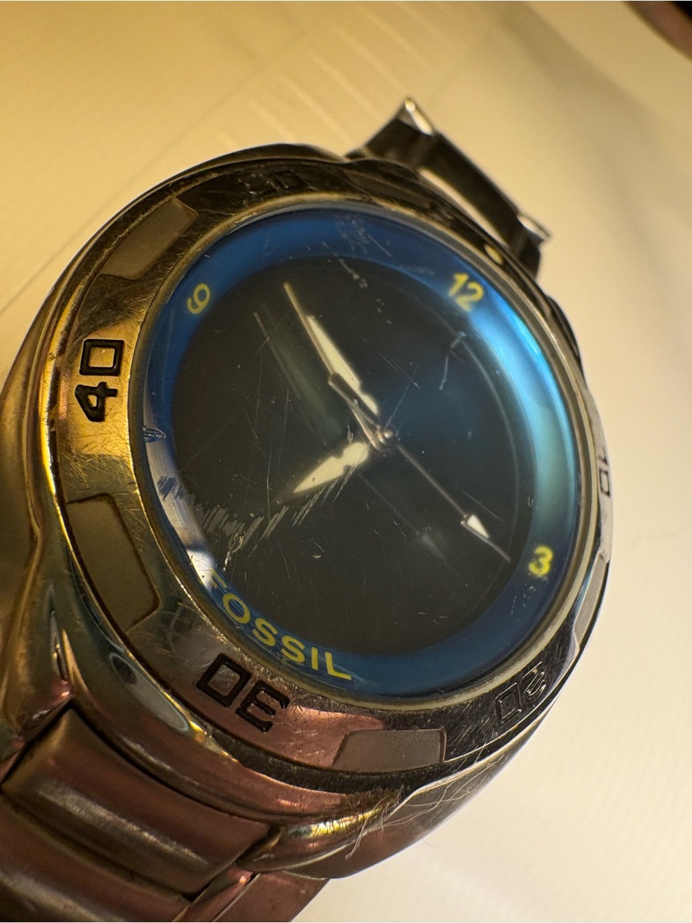 Fossil Silver Watch with Blue Dial and Yellow Accents